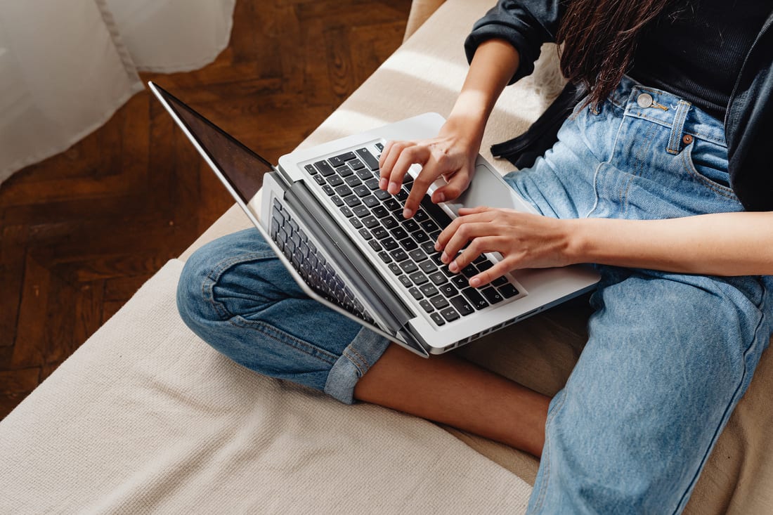 Person filling out an intake form on a laptop